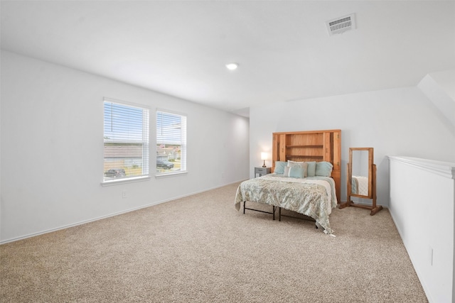 bedroom with light carpet