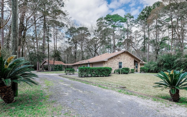 view of home's exterior with a lawn