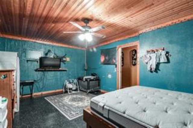 800 Oak St, Anahuac, TX 77514 - bedroom featuring wooden ceiling and baseboards