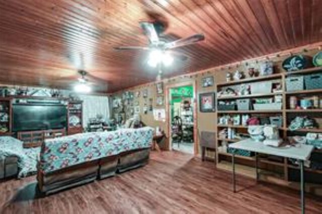 800 Oak St, Anahuac, TX 77514 - living area with ceiling fan, wooden ceiling, and wood finished floors