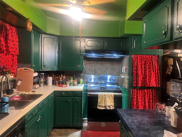 800 Oak St, Anahuac, TX 77514 - kitchen featuring electric range oven, green cabinets, and under cabinet range hood