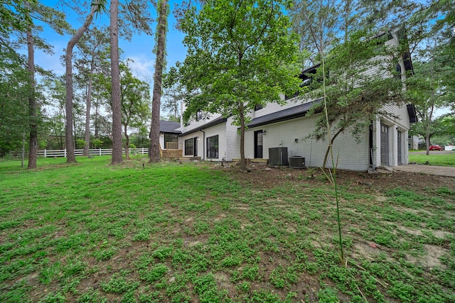 view of yard with central AC