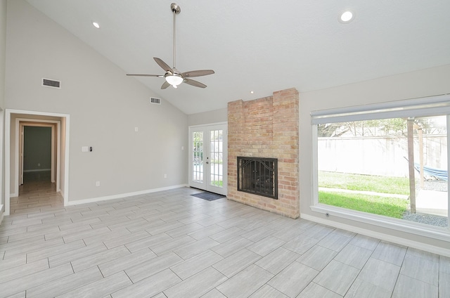 unfurnished living room featuring french doors, a fireplace, visible vents, and baseboards