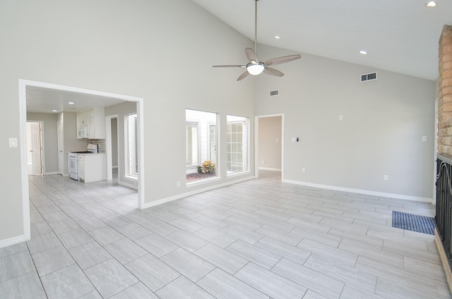 unfurnished living room with a large fireplace, visible vents, a ceiling fan, and baseboards