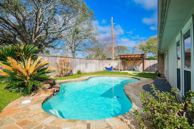 view of swimming pool featuring a fenced backyard, a pergola, and a fenced in pool