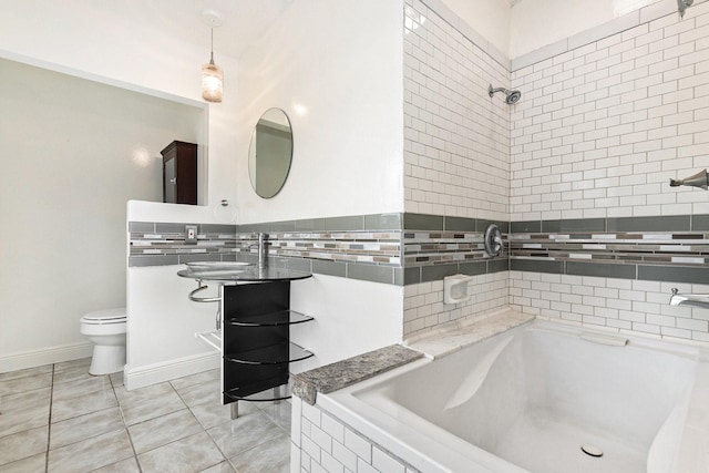 bathroom with tile patterned floors and toilet