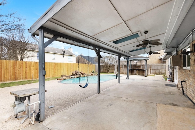 view of pool featuring a patio and ceiling fan