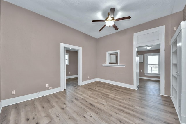 interior space featuring ceiling fan and light wood-type flooring