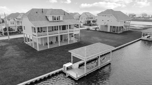 exterior space with a patio and a water view