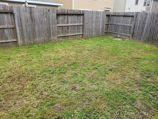view of yard featuring fence private yard