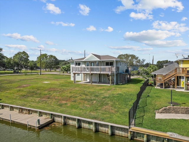 106 Palm Dr Unit Cr776, Liverpool, TX 77577 - dock area with a deck with water view, stairway, and a lawn