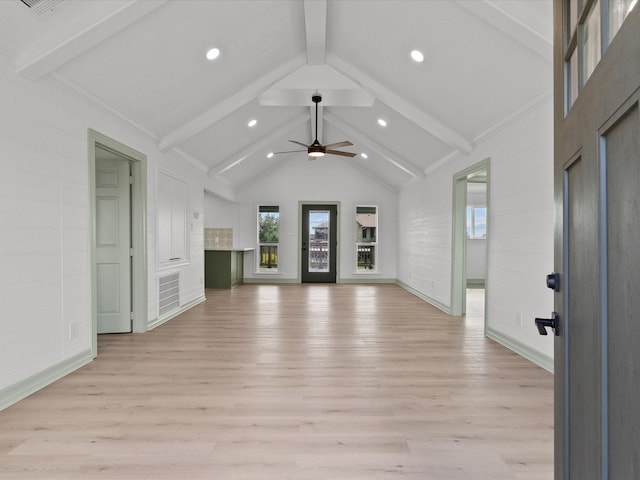 unfurnished living room featuring high vaulted ceiling, beam ceiling, ornamental molding, and light wood-type flooring