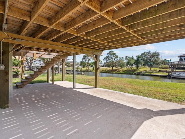 106 Palm Dr Unit Cr776, Liverpool, TX 77577 - view of patio / terrace featuring stairs and a water view