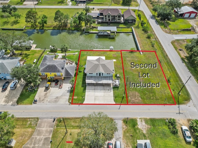 106 Palm Dr Unit Cr776, Liverpool, TX 77577 - aerial perspective of suburban area featuring a large body of water and property boundaries highlighted