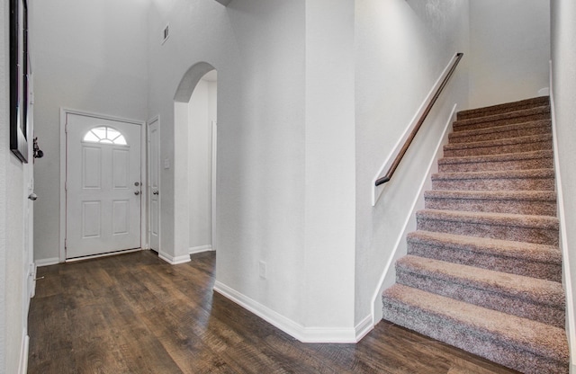 foyer entrance featuring dark hardwood / wood-style flooring