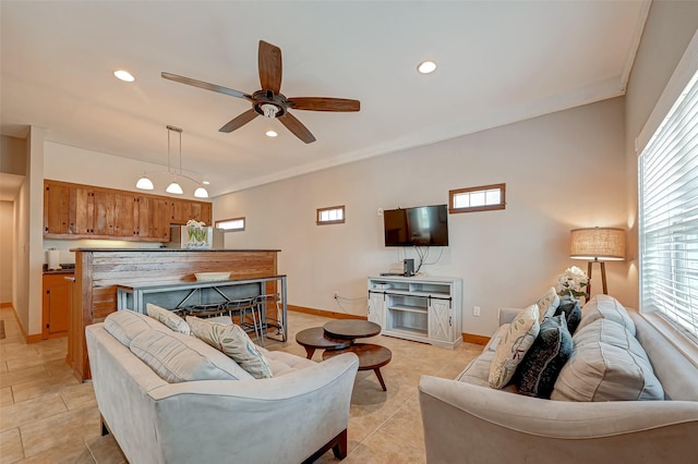 3520 Ave S Unit 1/2, Galveston, TX 77550 - tiled living room featuring ornamental molding and ceiling fan