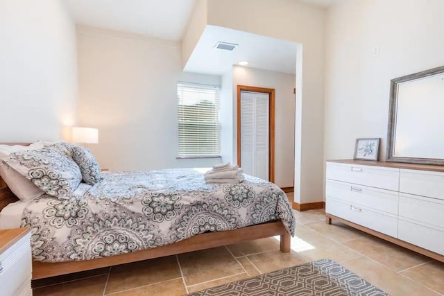 3520 Ave S Unit 1/2, Galveston, TX 77550 - bedroom featuring light tile patterned floors