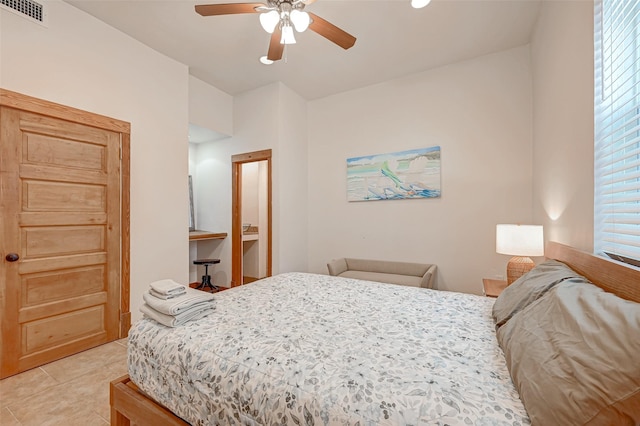 3520 Ave S Unit 1/2, Galveston, TX 77550 - tiled bedroom with multiple windows and ceiling fan