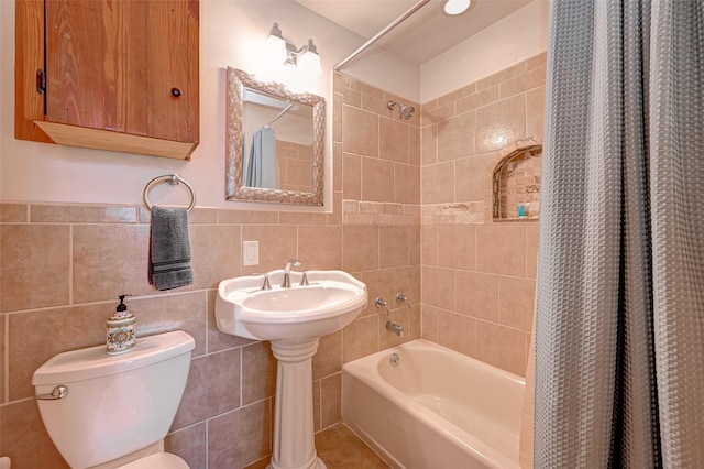 3520 Ave S Unit 1/2, Galveston, TX 77550 - bathroom featuring tile walls, shower / bath combination with curtain, and toilet