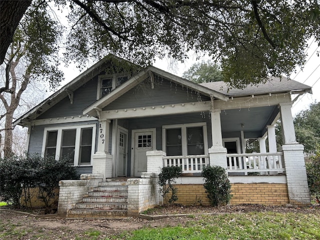 craftsman inspired home featuring a porch