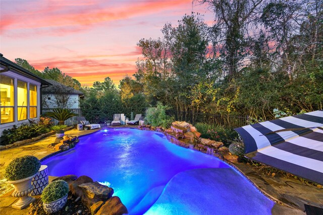 view of pool featuring a fenced in pool and a fenced backyard