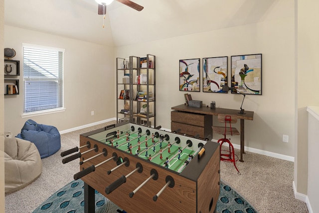 recreation room featuring lofted ceiling, carpet floors, and ceiling fan