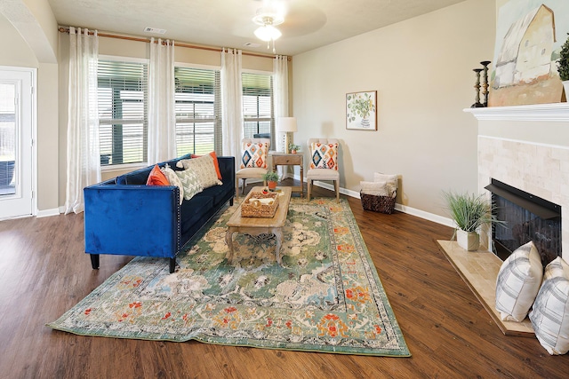 living room with dark hardwood / wood-style flooring