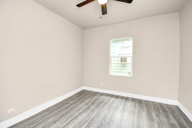 empty room featuring ceiling fan and wood-type flooring