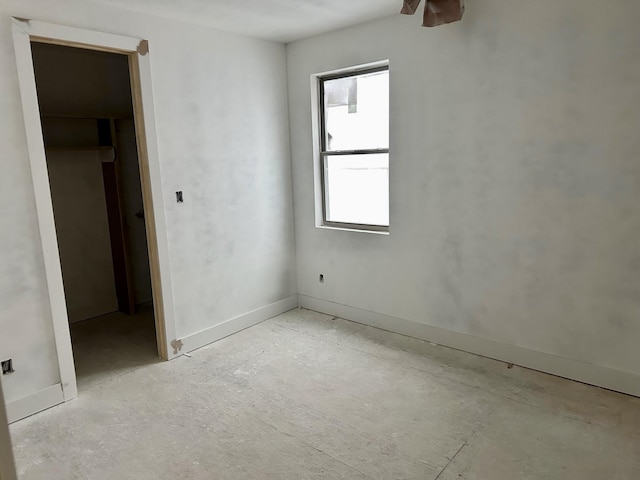 unfurnished bedroom featuring baseboards