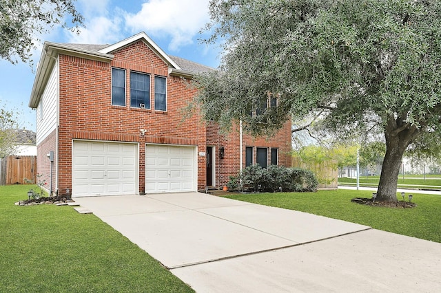 view of front of home featuring a garage and a front lawn