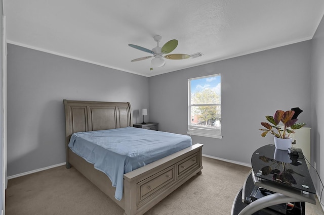 bedroom featuring light carpet, crown molding, and ceiling fan