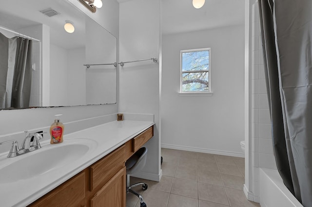 full bathroom with tile patterned flooring, vanity, shower / bath combo with shower curtain, and toilet