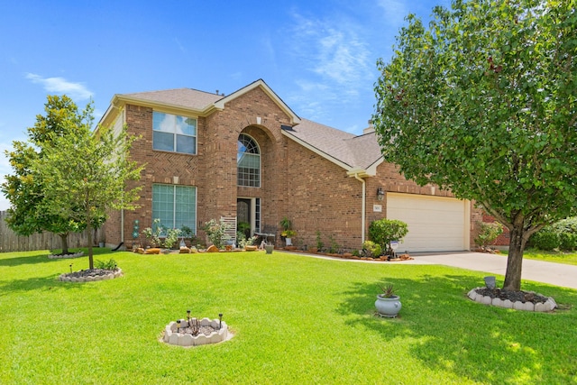 view of front of home featuring a garage and a front lawn