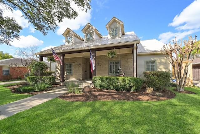 view of front of house featuring a porch and a front lawn