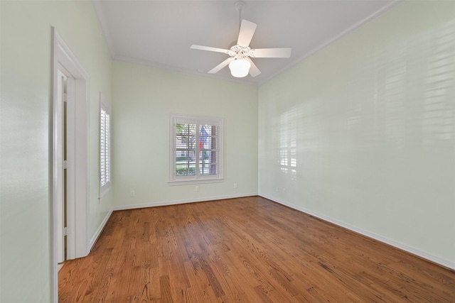 unfurnished bedroom featuring ornamental molding, ceiling fan, and light hardwood / wood-style flooring