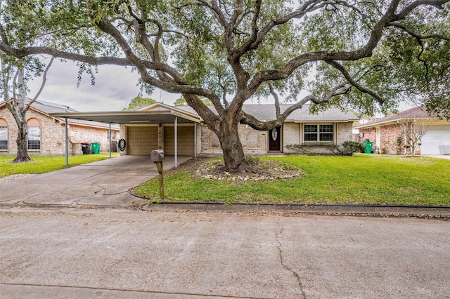 single story home with a front yard and a carport