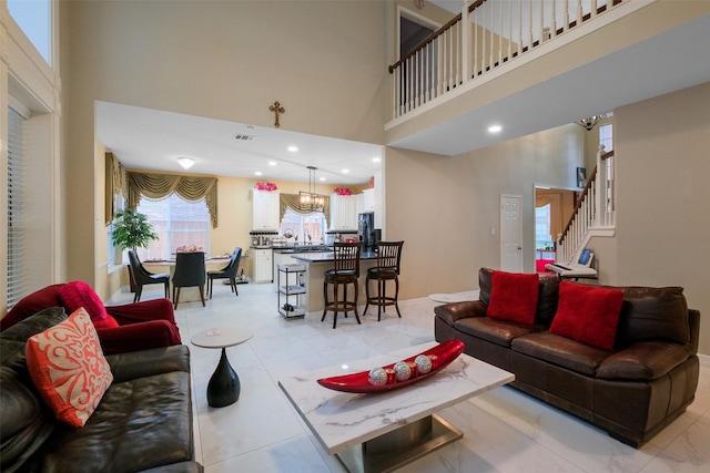 living room with a high ceiling