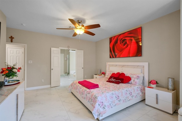 bedroom featuring ceiling fan and ensuite bath