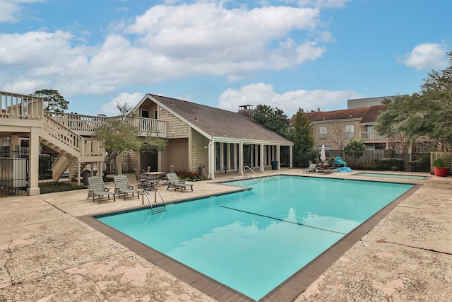 view of pool featuring a patio area