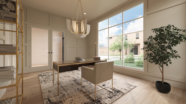 office area with a healthy amount of sunlight and light wood-type flooring