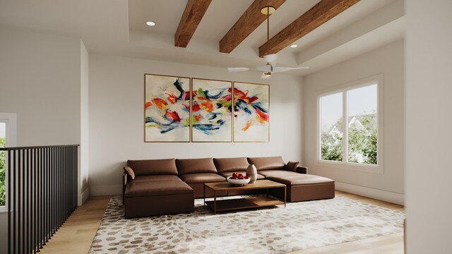 living room with beamed ceiling and light wood-type flooring