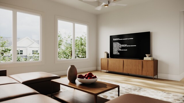 living room with ceiling fan and light wood-type flooring