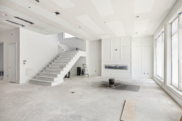 1615 Milford St, Houston, TX 77006 - unfurnished living room with stairway