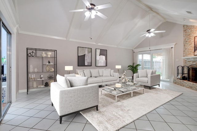 tiled living room featuring ceiling fan, a fireplace, high vaulted ceiling, and beam ceiling