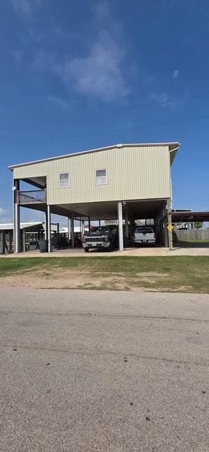 view of car parking featuring a carport