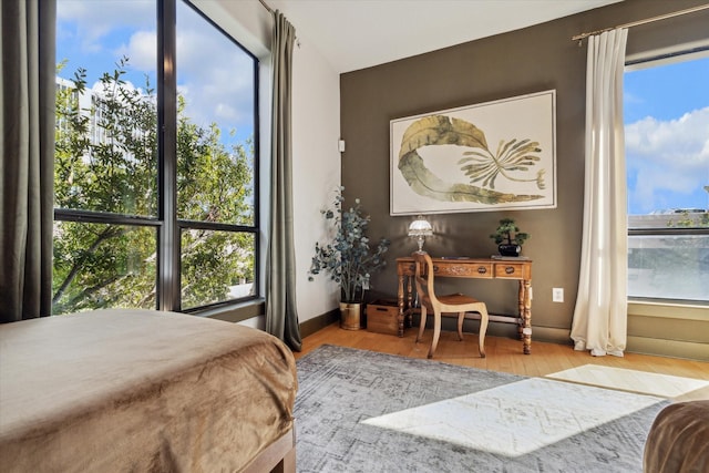 bedroom with light hardwood / wood-style floors