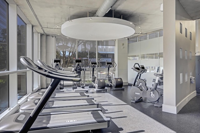 exercise room with a wall of windows