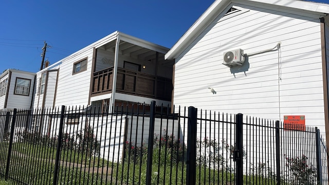 view of home's exterior featuring a balcony