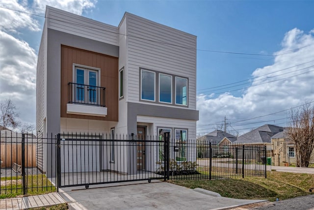 view of side of home with a balcony