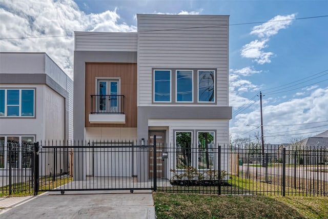 view of front of home with a balcony